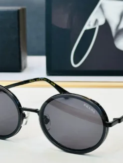 PRADA Glasses & Sunglasses B1520260504637599