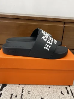 HERMES Slides & Slippers Rubber (Black-White) EU39-46 A0020260603151569