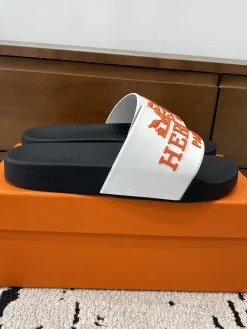 HERMES Slides & Slippers Rubber (Black-White-Orange) EU39-46 A0020260603329869