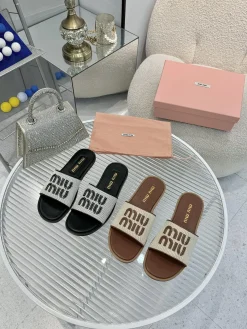 MIU MIU Slides & Slippers Canvas-Leather (Black-White-Brown) A50202607050679
