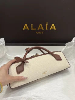 ALAIA Shoulder Bags Canvas Leather (Cream-Brown) 31X10X7CM G00202608100417