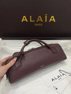 ALAIA Top Handle Bags Cow Leather (Burgundy) 31X10X7CM G00202608100415
