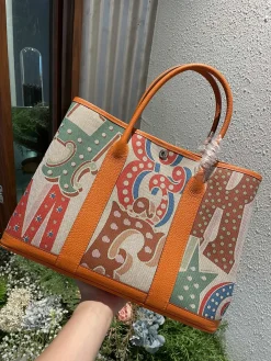 HERMES Totes Bags Canvas Togo Leather (Orange-Multi) One Size A000202608090062