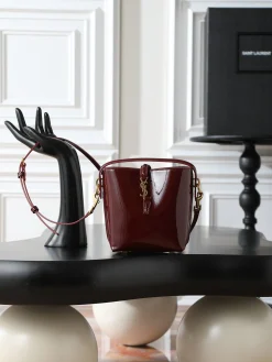 SAINT LAURENT Bucket Bags Patent Leather (Burgundy-Gold) 15X13X6CM D50202608080846